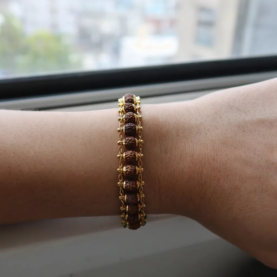Gold plated 5 mukhi rudraksha bracelet - story use