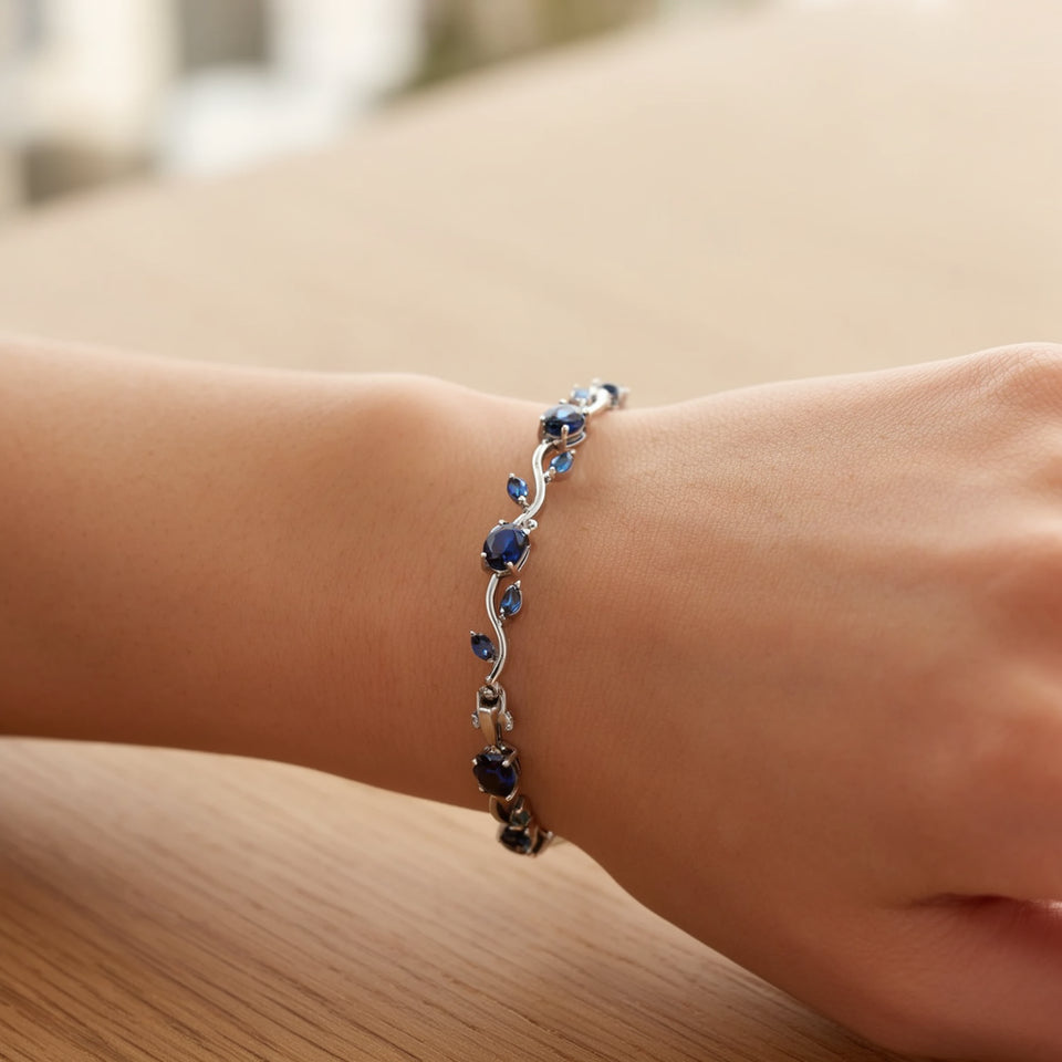 Blue tulip bracelet worn on the wrist