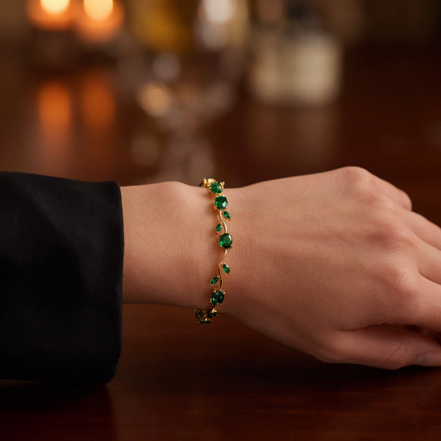 Green tulip bracelet on a wrist at an evening event