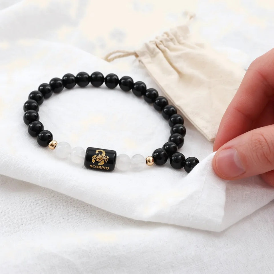 Scorpio zodiac bracelet on a soft cloth with a pouch