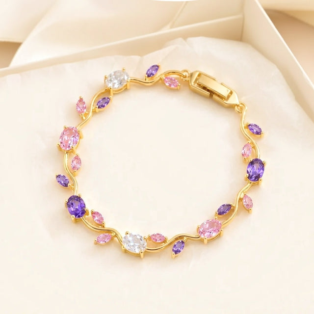 Pink and purple tulip bracelet in a cream gift box with soft tissue paper