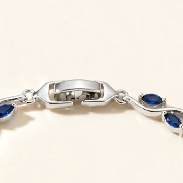 Close view of the fold over clasp on the blue tulip bracelet