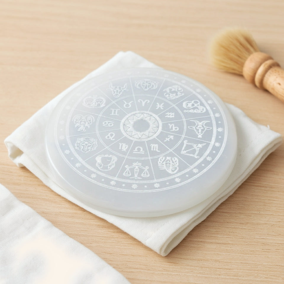 Selenite charging plate resting on a dry cotton cloth with a soft dry brush, no water