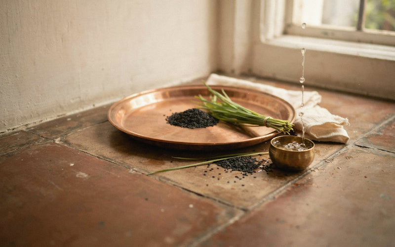 Pitru Paksha tarpan with a copper plate
