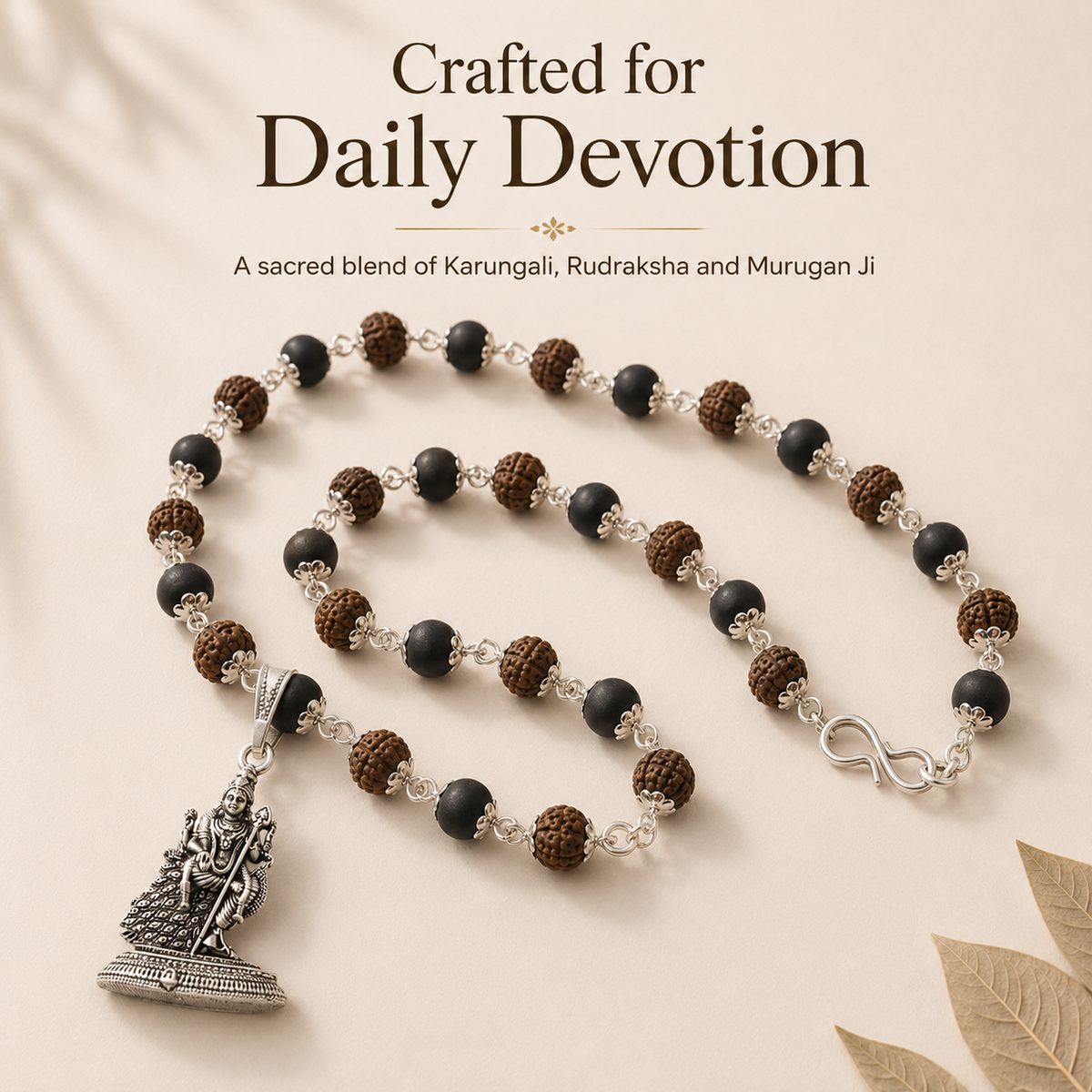 Silver-Capped Rudraksha Karungali Mala with Lord Murugan Pendant