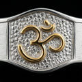 Close-up of the raised gold Om on the textured centre plate