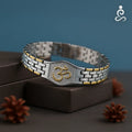 Om Bracelet for Men on a leather box, blue background