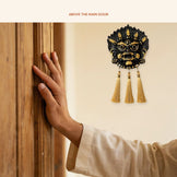 Kirtimukh Wall Hanging (Black with Tassel), in use