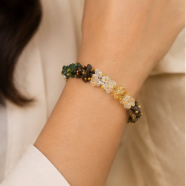 Dhan Yog gemstone chip bracelet worn on the wrist