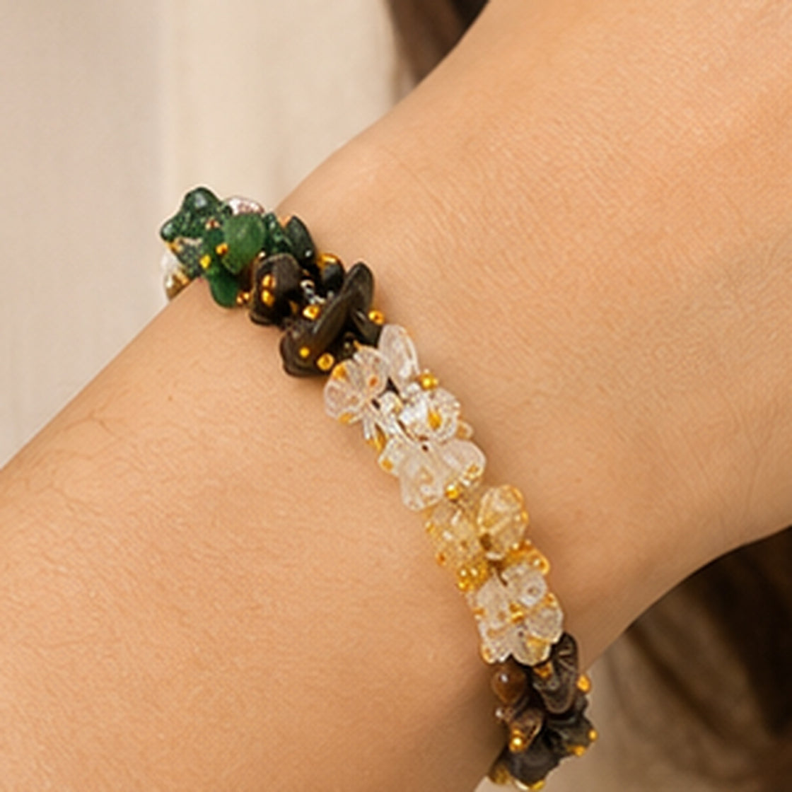 Women's Dhan Yog gemstone chip bracelet on a woman's wrist