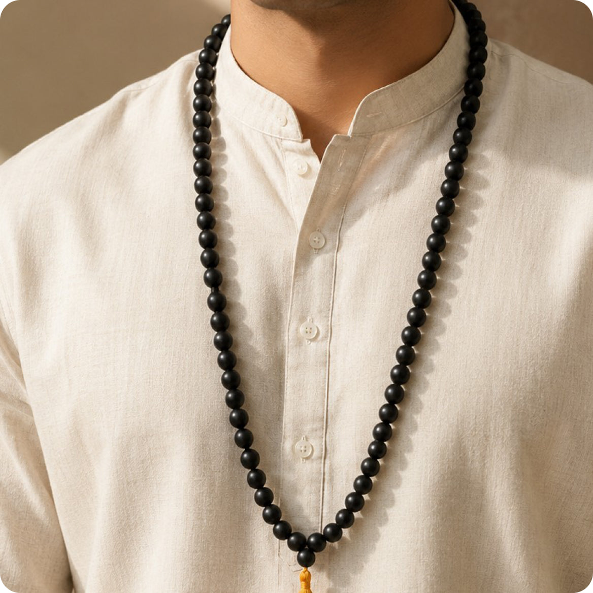 Karungali mala on cream kurta