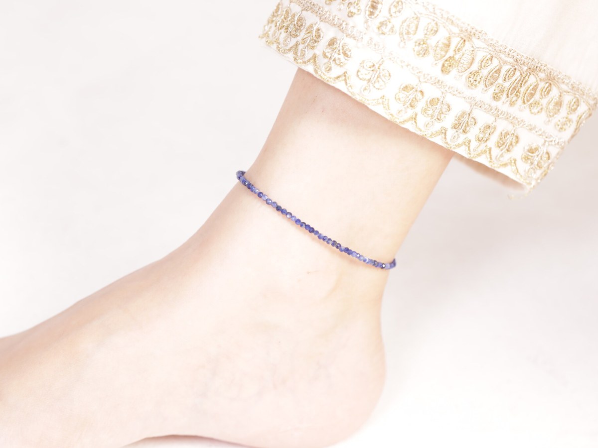 Lapis lazuli anklet on ankle