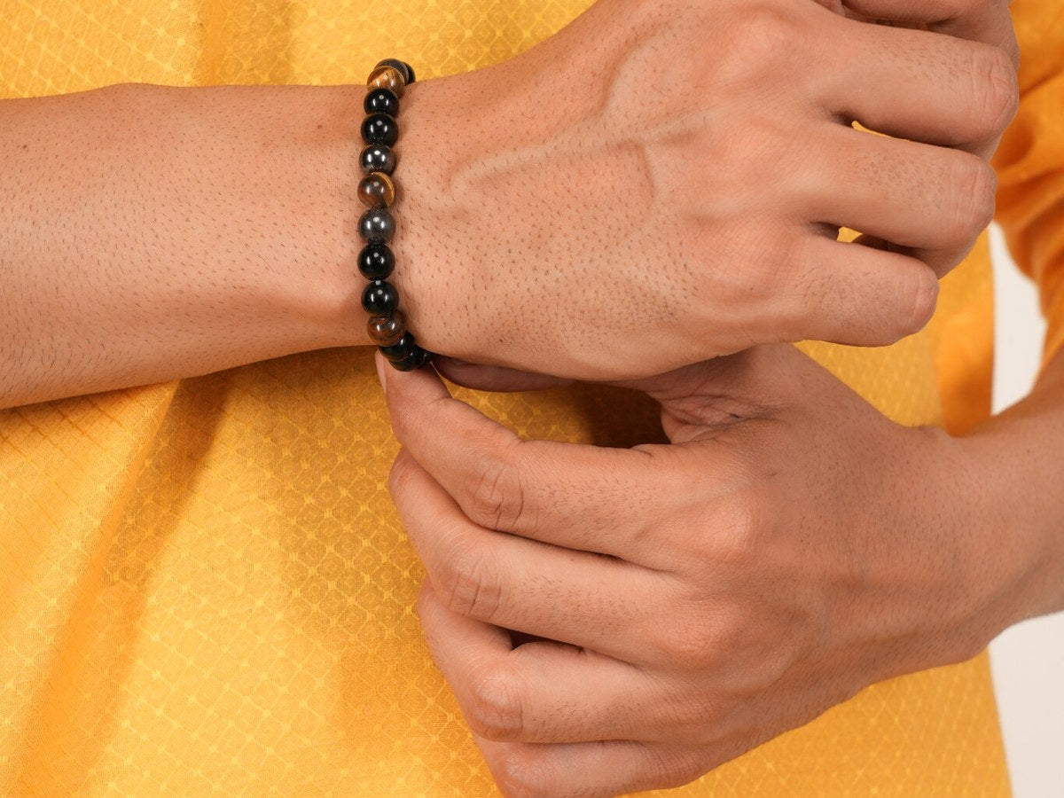 Man wearing Triple Protection bracelet
