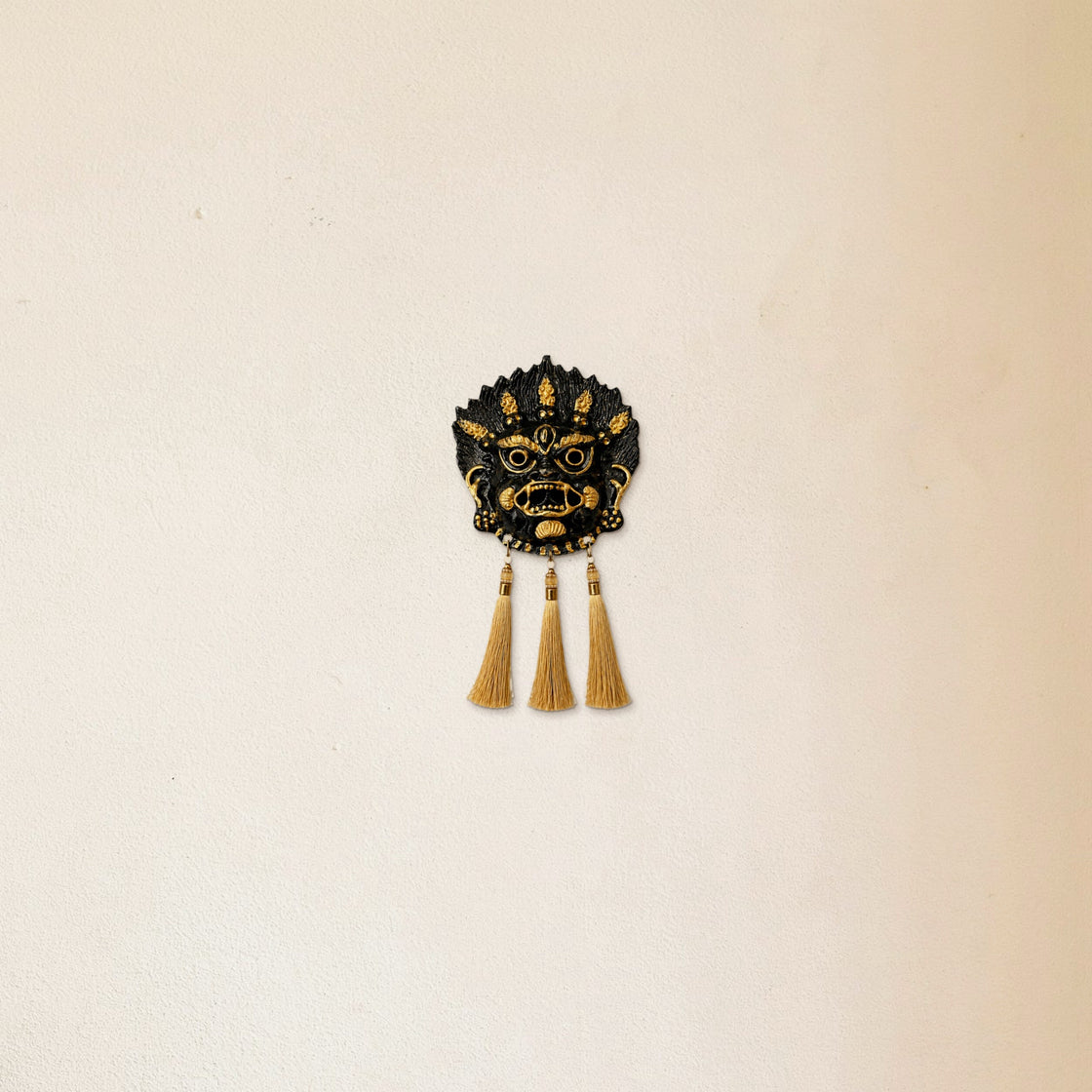The hanging on a plain wall in a living room