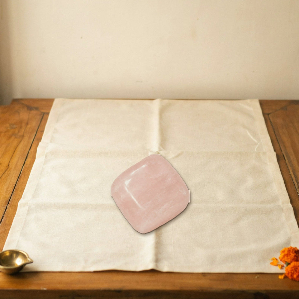 rose quartz love attraction tumble placed on a shelf