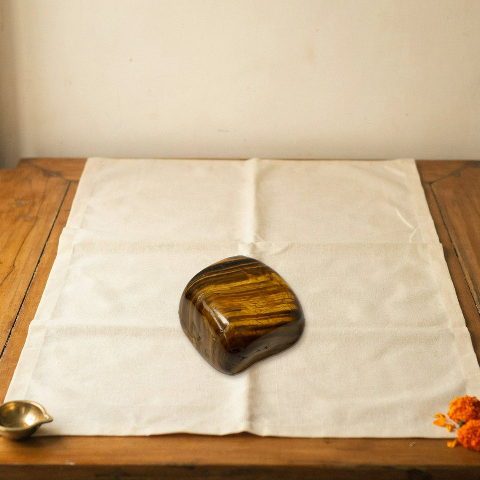 tiger eye tumble placed on a shelf