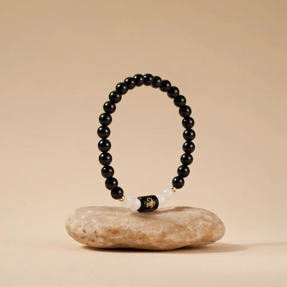 Scorpio zodiac bracelet standing on a stone