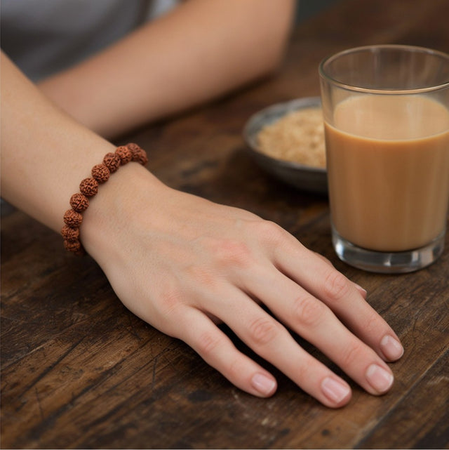 5 Mukhi Rudraksha Bracelet, everyday, with a coffee