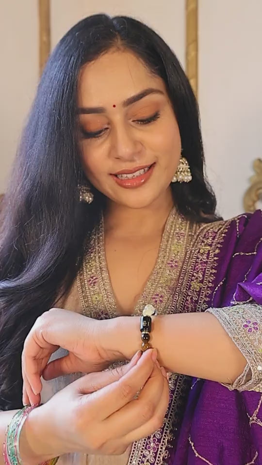 Woman wearing a Dhan Yog bracelet
