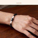 Scorpio Zodiac Black Obsidian & Milky Quartz Bracelet, on the wrist